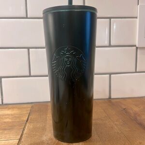 Starbucks cup in dark green metal
